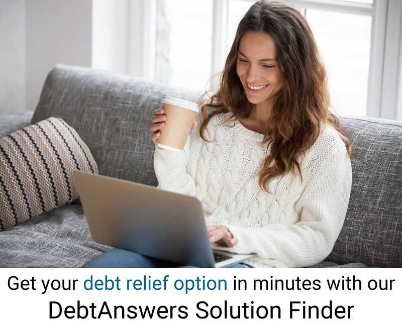 Woman on laptop completing DebtAnswers Canada online questionnaire to find her debt relief options